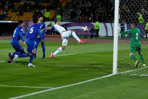 VAHID SALEMI / THE ASSOCIATED PRESS FILES
                                Iran&rsquo;s Mehdi Taremi (center) scores his side&rsquo;s second goal against Uzbekistan during the World Cup qualifying match in Tehran last year. The Iranian soccer team booked their ticket to the 2026 World Cup with the draw against Uzbekistan last March.