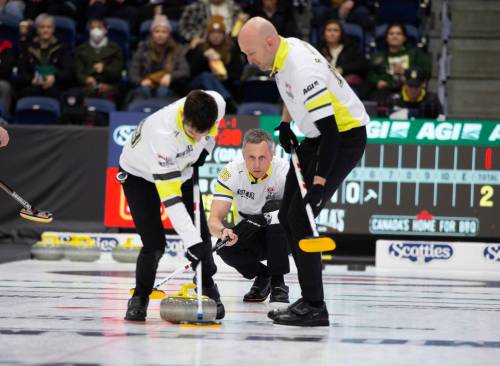 PAUL DALY / THE CANADIAN PRESS
                                E.J. Harnden (centre) committed himself to a strength and fitness routine that help to revolutionize the game of curling.
