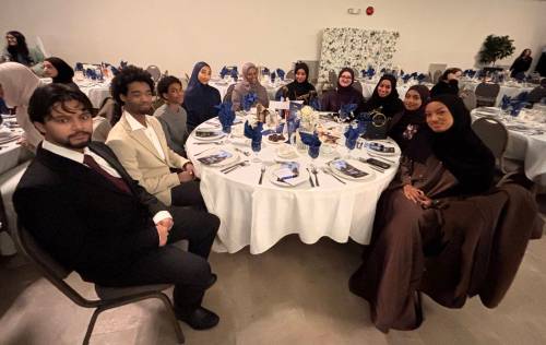 JOHN LONGHURST / FREE PRESS
                                Youth from the Winnipeg Ethiopian Canadian Muslim Community Association attend the March 8 grand iftar.
