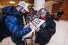JOHN WOODS / FREE PRESS
                                Colton Lott is greeted by Marsha (left) and Margaret Simmons as he arrives at Winnipeg airport Monday after Team Dunstone won the Brier in St. John&rsquo;s on Sunday.