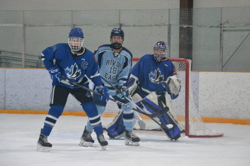 SUPPLIED
                                The Jeanne-Sauvé Olympiens are set to play in the AAAA high school provincial boys&rsquo; hockey championships for just the third time in the program&rsquo;s history. From left: Olympiens captain Cole Baker defends against River East Kodiaks forward Brook Bjornson as Olympiens goaltender Braiden Triechel defends the net.