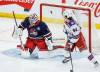 John Woods / THE CANADIAN PRESS
                                New York Rangers&rsquo; Gabe Perreault watches as teammate Adam Fox&rsquo;s shot gets past Winnipeg Jets goaltender Connor Hellebuyck in the first period of the Rangers&rsquo; 6-3 win, Thursday.