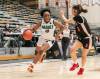 BROOK JONES/FREE PRESS
                                The host Vincent Massey Trojans earned a 74-53 victory over the visiting Sisler Spartans in the Manitoba High Schools Athletic Assoiciation AAAA varsity girls basketball semi-final at Investors Group Athletic Centre at the University of Manitoba, Wednesday. The Trojans advance to the championship game. Pictured: Trojans guard Kishi Folarin (No. 10) drives to the hoop while Spartans guard Keane Sarmiento (No. 3) defends during first quarter action.