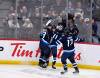 Fred Greenslade / THE CANADIAN PRESS
                                Winnipeg Jets&rsquo; Cole Perfetti celebrates his goal with Gabriel Vilardi and Adam Lowry during the second period of the Jets 4-1 win over the Vegas Golden Knights Tuesday, in Winnipeg.