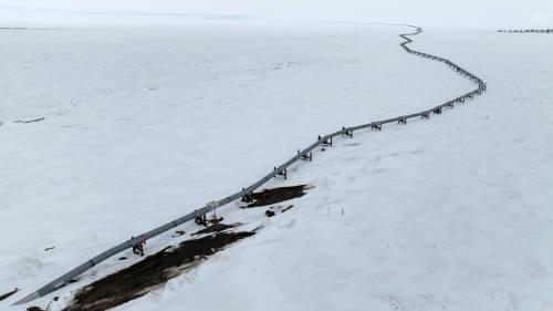 Jenny Kane photo
                                The start of the Trans-Alaska Pipeline at the Pump Station 1 near Deadhorse, Alaska. More than half of the 1,200-km-long pipeline is above ground on support beams.