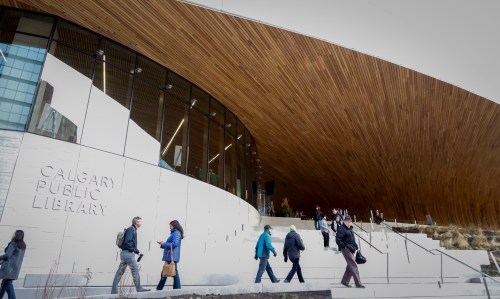 Visitors explore the new Calgary Library following its opening in Calgary on Thursday, Nov. 1, 2018. THE CANADIAN PRESS/Jeff McIntosh