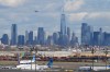 FILE - The New York City skyline is seen behind a plane approaching Newark International Airport in Newark, N.J., Nov. 6, 2025. (AP Photo/Seth Wenig, File)