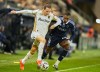 Lens' Florian Thauvinl, left, dribbles from Paris' Otavio Ataide Da Silva during the French League One soccer match between Paris FC and Lens in Paris, Saturday, Feb. 14, 2026. (AP Photo/Michel Euler)