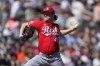 Cincinnati Reds starting pitcher Andrew Abbott throws against the San Francisco Giants during the first inning of a spring training baseball game Friday, March 6, 2026, in Scottsdale, Ariz. (AP Photo/Ross D. Franklin)