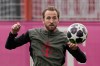 Bayern's Harry Kane stops a ball during a training session in Munich, Germany, Monday, March 9, 2026, ahead of the Champions League round of 16 soccer match between Atalanta Bergamo and FC Bayern. (AP Photo/Matthias Schrader)