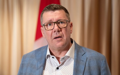 Saskatchewan Premier Scott Moe speaks with reporters in Mumbai, India, Friday, Feb. 27, 2026. THE CANADIAN PRESS/Adrian Wyld