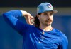 Toronto Blue Jays pitcher Dylan Cease warms up at spring training in Dunedin, Fla. on Feb. 20, 2026. THE CANADIAN PRESS/Frank Gunn