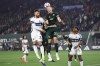 Vancouver Whitecaps defender Tristan Blackmon (33) and Portland Timbers' Finn Surman (20) jump up for a head ball during an MLS soccer match, Saturday, March 7, 2026, in Portland, Ore. (AP Photo/Amanda Loman)