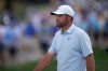 Scottie Scheffler walks on the first green during the second round of the Arnold Palmer Invitational at Bay Hill golf tournament Friday, March 6, 2026, in Orlando, Fla. (AP Photo/Matt Slocum)