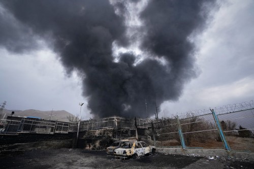 A thick plume of smoke rises from an oil storage facility hit by a U.S.-Israeli strike late Saturday in Tehran, Iran, Sunday, March 8, 2026. THE CANADIAN PRESS/AP-Vahid Salemi