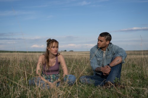 This image released by Universal Pictures shows Maika Monroe, left, and Tyriq Withers in a scene from 