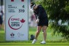 Brigitte Kim Thibault, of Canada, hits her tee shot on the 14th hole during the second round at the LPGA CPKC Canadian Women's Open golf tournament, in Vancouver, on Friday, August 25, 2023. THE CANADIAN PRESS/Darryl Dyck
