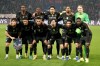 PSG players pose ahead of the first leg of the Champions League round of 16 soccer match between Paris Saint-Germain and Chelsea, in Paris, Wednesday, March 11, 2026. (AP Photo/Michel Euler)
