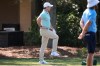 Rory McIlroy, of Northern Ireland, stretches his legs while hitting practice shots during a practice round for The Players Championship golf tournament Wednesday, March 11, 2026, in Ponte Vedra Beach, Fla. (AP Photo/Gerald Herbert)