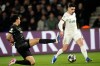 Chelsea's Pedro Neto, right, and PSG's Marquinhos challenge for the ball during the first leg of the Champions League round of 16 soccer match between Paris Saint-Germain and Chelsea, in Paris, Wednesday, March 11, 2026. (AP Photo/Michel Euler)