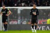 Tottenham's Xavi Simons, right, and Tottenham's Micky van de Ven react at the end of the first leg of the Champions League round of 16 soccer match between Atletico Madrid and Tottenham in Madrid, Spain, Tuesday, March 10, 2026. (AP Photo/Jose Breton)