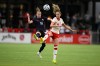 United States defender Emily Sonnett, left, and Canada forward Jordyn Huitema (9) battle for the ball during the first half of an international friendly soccer match, Wednesday, July 2, 2025, in Washington. (AP Photo/Nick Wass)