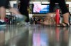 People walk through the departures area of Terminal 1 of Toronto Pearson International Airport on Aug. 13 2025. THE CANADIAN PRESS/Arlyn McAdorey