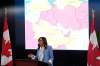 A map showing travel advisory risk levels in the Middle East is shown as Minister of Foreign Affairs Anita Anand speaks at a news conference at the Emergency Watch and Response Centre at Global Affairs Canada in Ottawa, on Wednesday, March 4, 2026. THE CANADIAN PRESS/Justin Tang