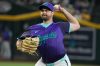 FILE - Arizona Diamondbacks pitcher Jalen Beeks throws against the Los Angeles Dodgers during the first inning of a baseball game, Thursday, Sept. 25, 2025, in Phoenix. (AP Photo/Darryl Webb, File)