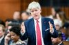 Minister of Energy and Natural Resources Tim Hodgson rises during Question Period in the House of Commons on Parliament Hill in Ottawa, on Tuesday, March 10, 2026. THE CANADIAN PRESS/Spencer Colby