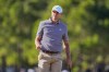 Ludvig Aberg of Sweden acknowledges applause from the gallery after sinking his putt on the 11th green during the second round of The Players Championship golf tournament Friday, March 13, 2026, in Ponte Vedra Beach, Fla. (AP Photo/Gerald Herbert)