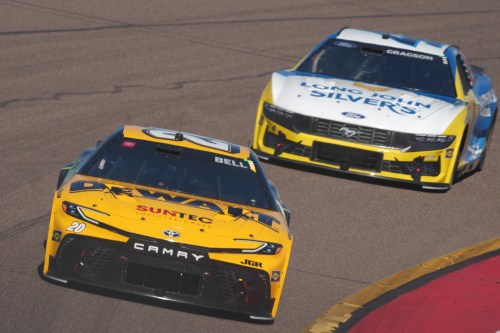 FILE - NASCAR Cup Series driver Christopher Bell, foreground, participates in a NASCAR Cup Series auto race Sunday, Nov. 2, 2025, in Avondale, Ariz. (AP Photo/Rick Scuteri, File)