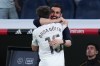 Real Madrid's Arda Guler celebrates with Real Madrid's head coach Alvaro Arbeloa after scoring his side's fourth goal during a Spanish La Liga soccer match between Real Madrid and Elche CF, in Madrid, Saturday, March 14, 2026. (AP Photo/Manu Fernandez)