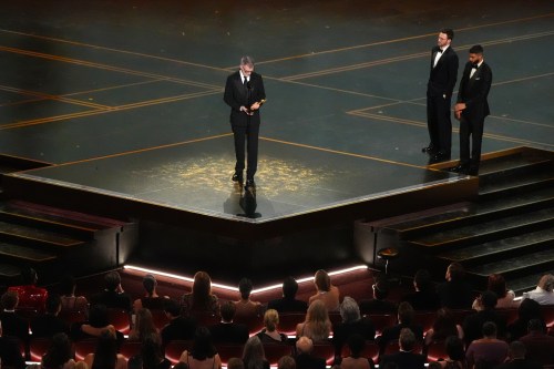 Paul Thomas Anderson accepts the award for writing (adapted screenplay) for 