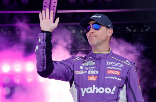 Denny Hamlin waves during driver introductions before a NASCAR Cup Series auto race at Las Vegas Motor Speedway Sunday, March 15, 2026, in Las Vegas. (AP Photo/Steve Marcus)