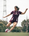 Iranian soccer player Atefeh Ramezanisadeh kicks a ball at a Brisbane Roar club training session in Brisbane, Australia, Monday, March 16, 2026. (Brisbane Roar via AP)