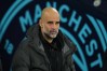 Manchester City's head coach Pep Guardiola stands on the sideline before the English Premier League soccer match between Manchetser City nad Newcastle in Manchester, England, Saturday, Feb. 21, 2026. (AP Photo/Jon Super)