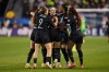 FILE - NJ/NY Gotham FC midfielder Rose Lavelle is mobbed by her teammates after scoring a goal during the second half of a NWSL women's championship soccer match against the Washington Spirit, Nov. 22, 2025, in San Jose, Calif. (AP Photo/Justine Willard, File)