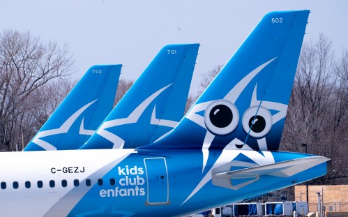 Air Transat planes are seen on the tarmac at Montreal-Trudeau International Airport in Montreal, on April 8, 2020. THE CANADIAN PRESS/Paul Chiasson