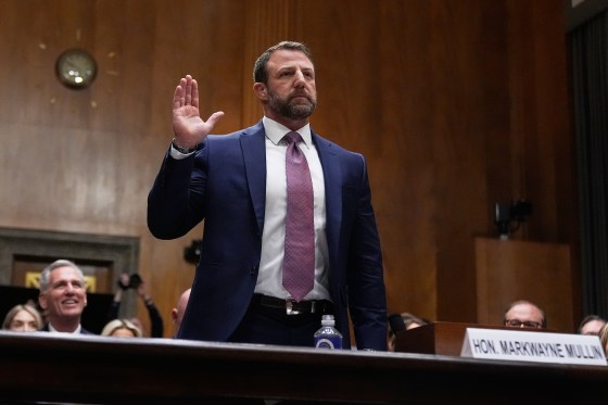 Sen. Markwayne Mullin, R-Okla., is sworn in before testifying during Senate Committee on Homeland Security and Governmental Affairs hearing Wednesday. (Manuel Balce Ceneta / The Associated Press)