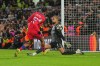 Chelsea's goalkeeper Robert Sanchez, right, makes a save from PSG's Bradley Barcola during the Champions League soccer match between Chelsea and Paris Saint-Germain in London, England, Tuesday, March 17, 2026. (AP Photo/Kin Cheung)