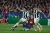 Newcastle's Sandro Tonali, left, and Kieran Trippier, right, stop Barcelona's Fermin Lopez during the Champions League round of 16, second leg soccer match between FC Barcelona and Newcastle United FC in Barcelona, Spain, Wednesday, March 18, 2026. (AP Photo/Joan Monfort)