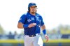 Toronto Blue Jays' Addison Barger runs to third base on a two-run single by Jesus Sanchez during the first inning of an exhibition baseball game against Canada on March 3, 2026, in Dunedin, Fla. (AP Photo/Chris O'Meara)