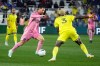 Inter Miami forward Lionel Messi moves the ball against Nashville SC defender Maxwell Woledzi (3) in the first half of a CONCACAF Champions Cup Round of 16 soccer match Wednesday, March 11, 2026, in Nashville, Tenn. (AP Photo/Mark Humphrey)
