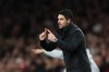 Arsenal's manager Mikel Arteta gives instructions to his players during the second leg of the Champions League round of 16 soccer match between Arsenal and Bayer Leverkusen, in London, Tuesday, March 17, 2026. (AP Photo/Ian Walton)
