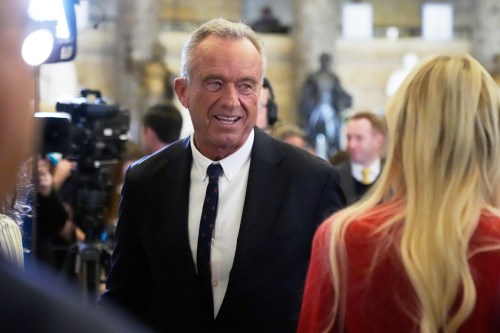 FILE - Health and Human Services Secretary Robert F. Kennedy Jr. arrives before President Donald Trump delivers the State of the Union address to a joint session of Congress in the House chamber at the U.S. Capitol in Washington, Feb. 24, 2026. (AP Photo/Mark Schiefelbein, File)