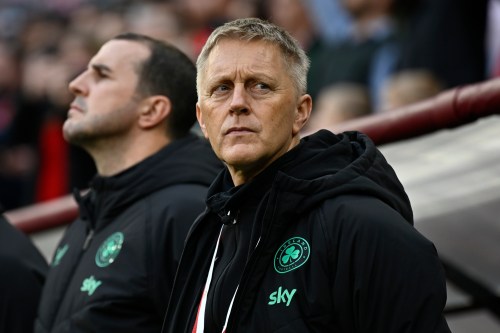FILE - Ireland coach Heimir Hallgrimsson stands near the bench before the World Cup 2026 group F qualifying soccer match between Hungary and Ireland in Budapest, Hungary, Nov. 16, 2025. (AP Photo/Denes Erdos, File)