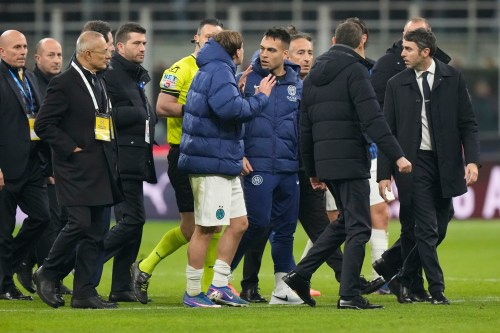 Inter Milan's Lautaro Martinez, centre right, reacts after the Serie A soccer match between AC Milan and Inter Milan, in Milan, Italy, Sunday, March 8, 2026. (AP Photo/Luca Bruno)