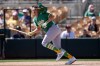 Athletics' Nick Kurtz loses his helmet as he watches the flight of his single against the Chicago White Sox during the first inning of a spring training baseball game, Tuesday, March 17, 2026, in Phoenix. (AP Photo/Ross D. Franklin)
