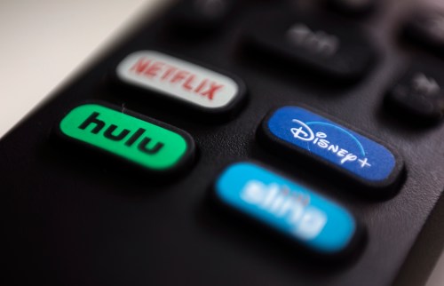 The logos for streaming services Netflix, Hulu, Disney Plus and Sling TV are pictured on a remote control on Aug. 13, 2020. (AP Photo/Jenny Kane, File)